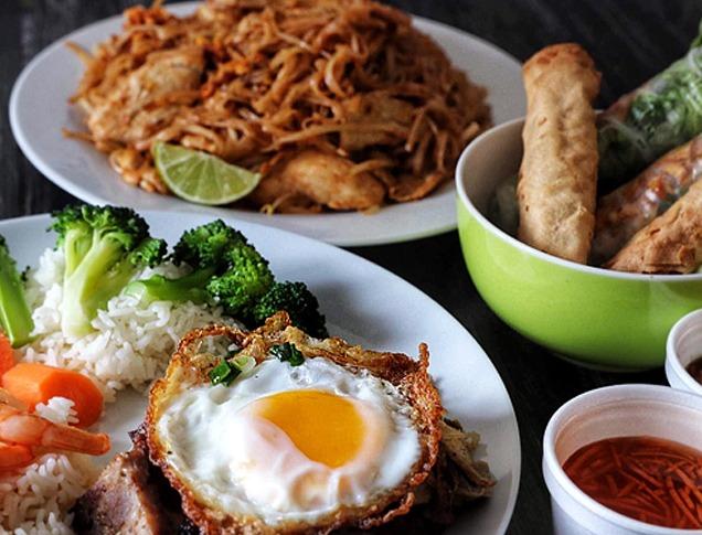 Various Vietnamese dishes on a table