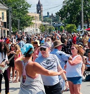 A large group of people gathered on the main strip of Wortley Village in London, Ont., dancing and listening to live music.
