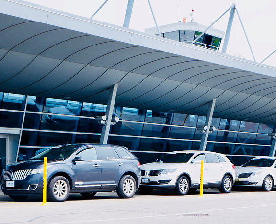 cars parked infront of London Airport