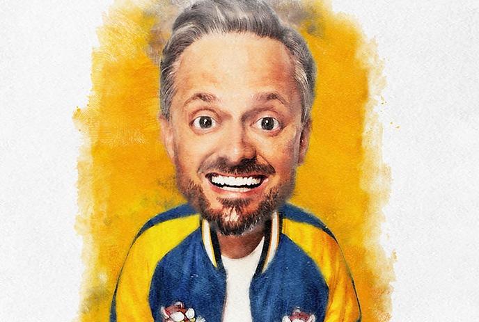 Comedian Nate Bargatze with gray hair, smiling in a blue and yellow jacket against a vibrant yellow background.